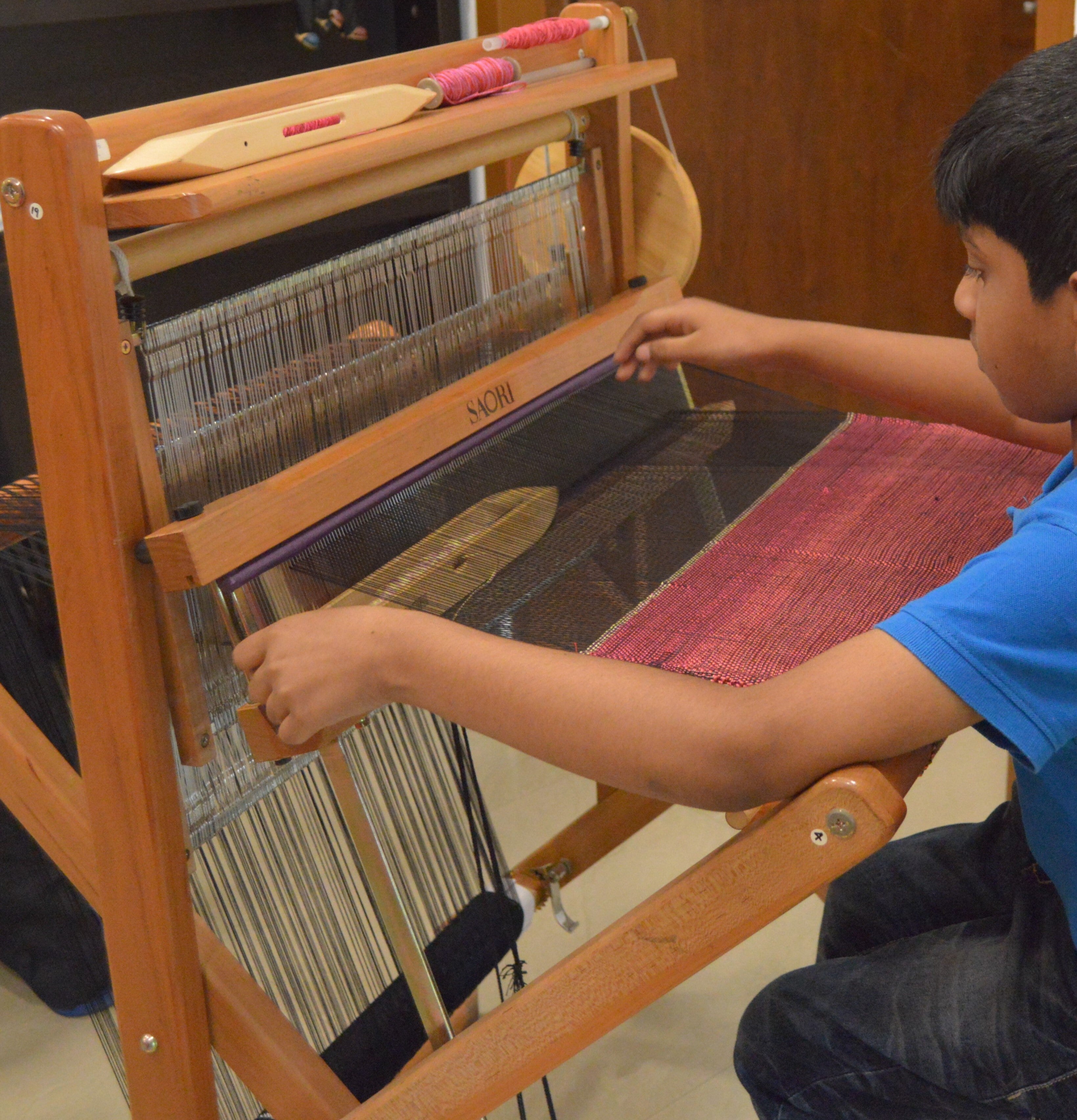WEAVING MUSICAL RHYTHM ON THE LOOM - Shuttles and Needles